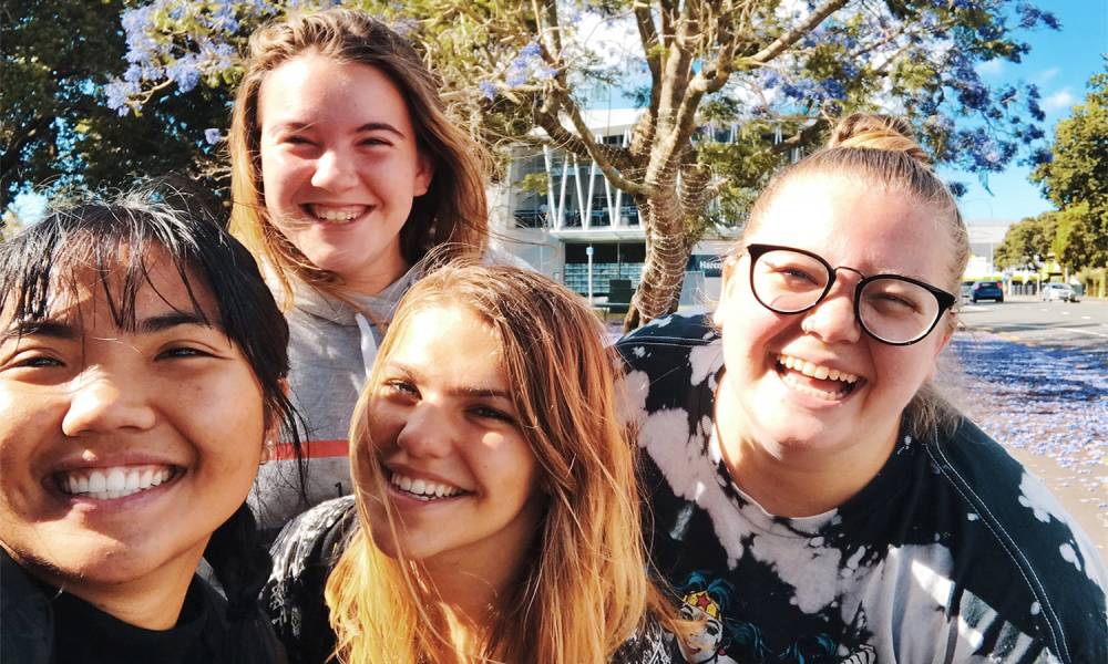 Group of very happy teens smiling